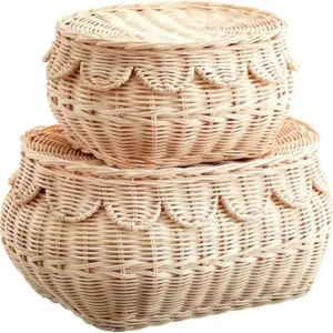 Stacked handwoven seagrass storage baskets with lids