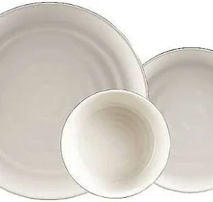 Top-down view of three cream stoneware bowls/mugs